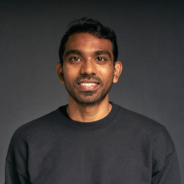 Deepak, smiling, black shirt