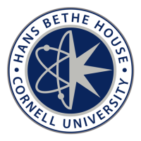 A circular logo with text along the outer edge. There is a grey atom in the middle with a dark blue background with the words Hans Bethe House Cornell University in a circle around it.